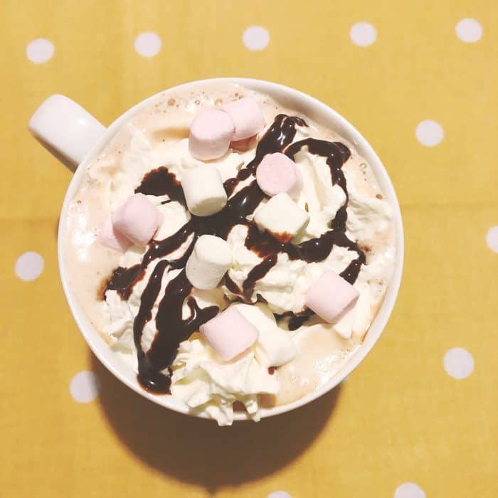 Hot chocolate with marshmallows and cream.