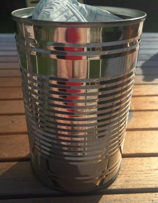 How to turn a tin can from the recycling pile into something pretty....