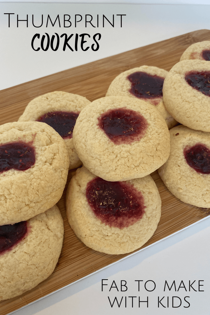 These Jammy Thumbprint cookies are not only super tasty, they're also easy to make and use ingredients you'll have in your cupboard! #cookingwithkids #kidsinthekitchen #homemade #biscuits