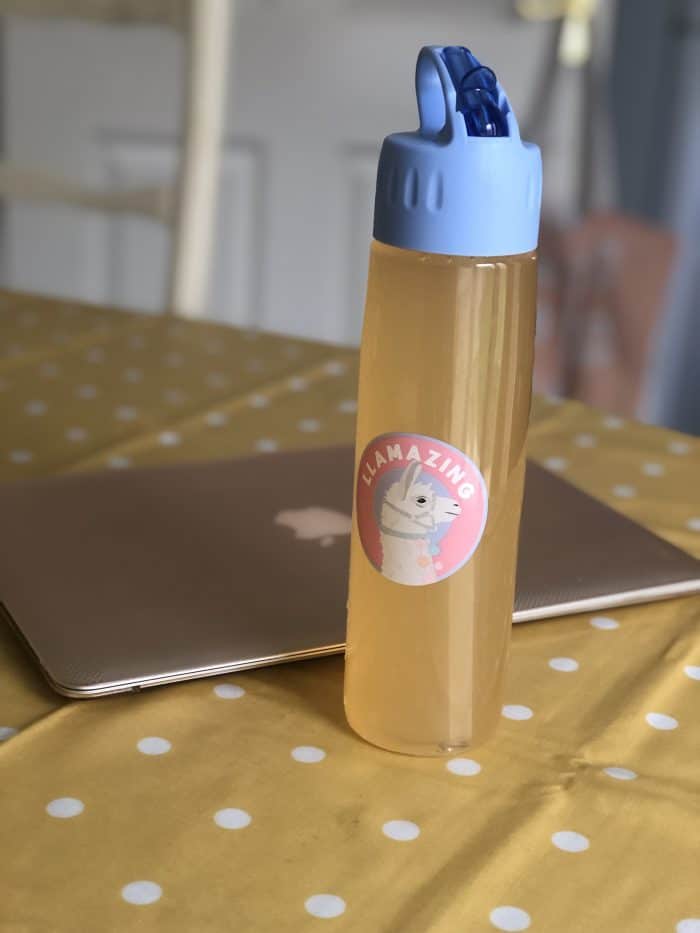 Drinking my juice from my bargain bottle.