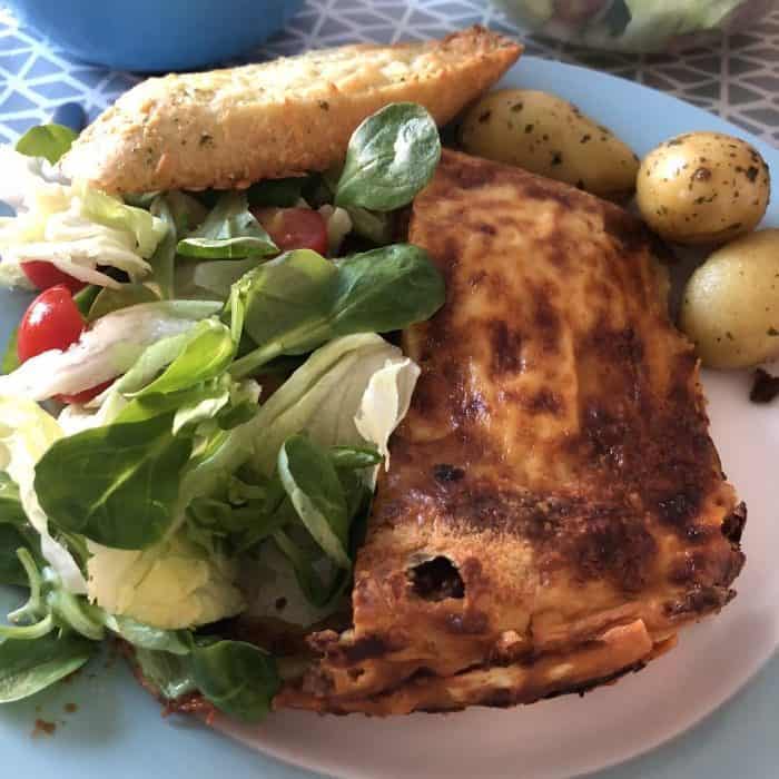 Lasagne, salad and garlic bread
